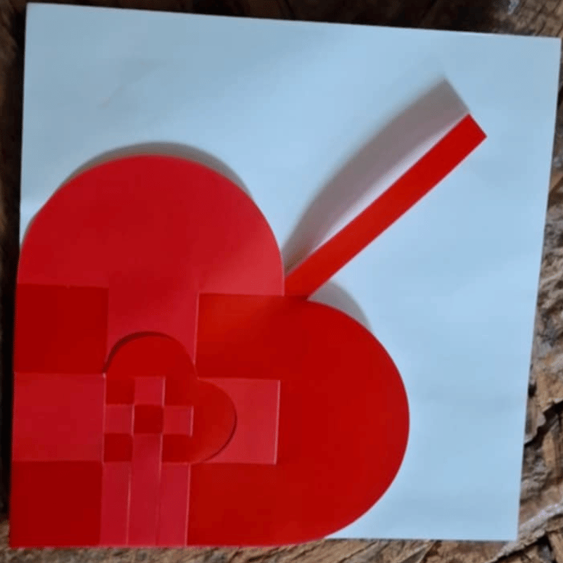 Dobbeltflettet rød/rosa julehjerte – håndflettet